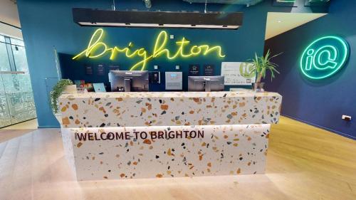 a store with a welcome to battery sign on a counter at For Students Only at iQ Brighton in Brighton & Hove