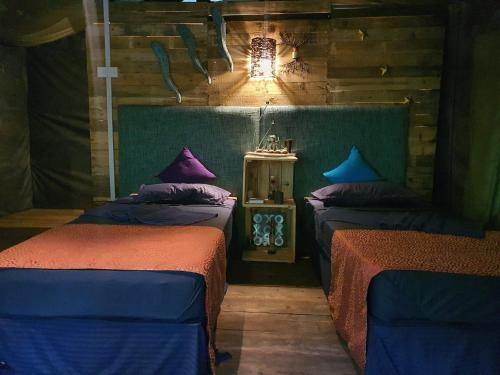 Postel nebo postele na pokoji v ubytování Canyon Girankitta Nature Resort