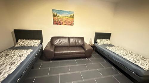 Giường trong phòng chung tại MK Apartment Delmenhorst 5 - Kostenloses WLAN - Kostenlose Parkplätze