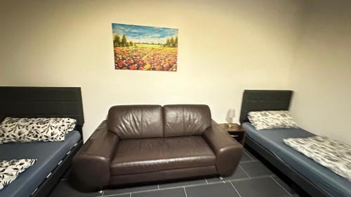 Khu vực ghế ngồi tại MK Apartment Delmenhorst 5 - Kostenloses WLAN - Kostenlose Parkplätze
