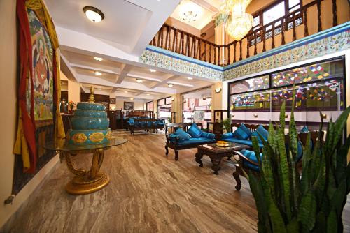 a room with couches and chairs in a store at Tibet Boutique Hotel in Kathmandu