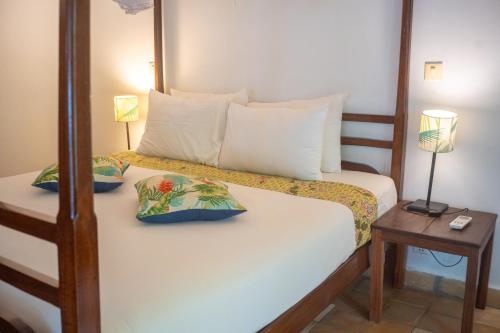 Postel nebo postele na pokoji v ubytování Sambor Village Hotel
