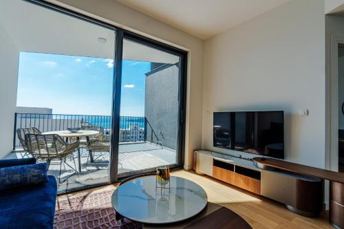 Et tv og/eller underholdning på Sunshine Appartement Budva