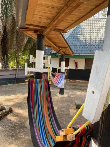 a group of hammocks tied to awning at SALEM Eco-Lodge & Guesthouse in Mbale