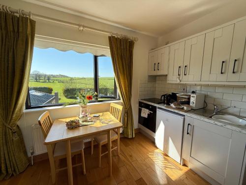Kuchyň nebo kuchyňský kout v ubytování keeloges Lodge