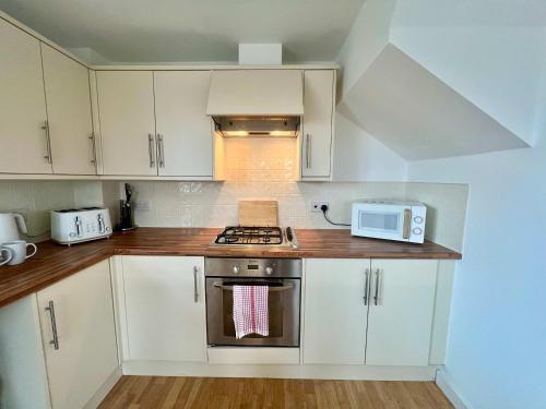 Kuchyň nebo kuchyňský kout v ubytování Halliday House