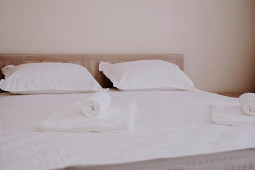 Katil atau katil-katil dalam bilik di New Hotel BEKARYS