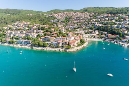 an aerial view of a small island in the water at Riva in Rabac