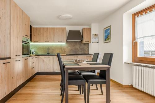 Kuchyň nebo kuchyňský kout v ubytování Celentino Apartment - close to the ski slopes PEIO