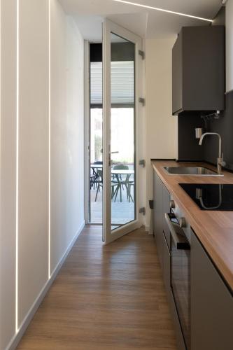 Kuchyň nebo kuchyňský kout v ubytování Tre Gemme in Centro - Suite Cobalto
