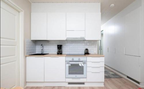 Dapur atau dapur kecil di Safaritalo Apartments