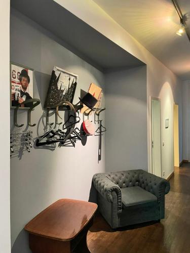 a living room with a couch and a table at Heart of Gold Hostel Berlin in Berlin