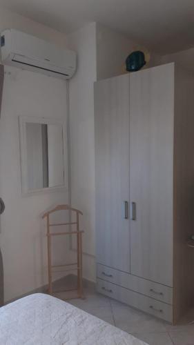 Postel nebo postele na pokoji v ubytování Le Trame di Ka.Sa