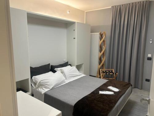 Postel nebo postele na pokoji v ubytování B&B Relax Rooms - Villa Murari Brà