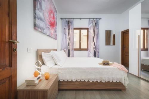 Postel nebo postele na pokoji v ubytování La Finestra su Guido Monaco