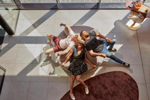 a group of people sitting on a table at Adagio access Brussels Delta in Brussels