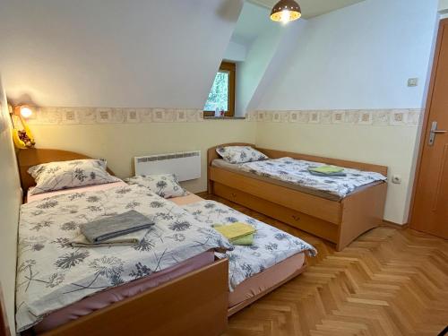 Postel nebo postele na pokoji v ubytování Apartment Crystal Rose