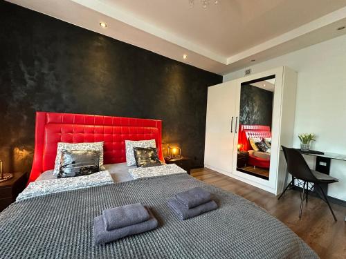 Posteľ alebo postele v izbe v ubytovaní Apartament Centrum Chmielna 73c