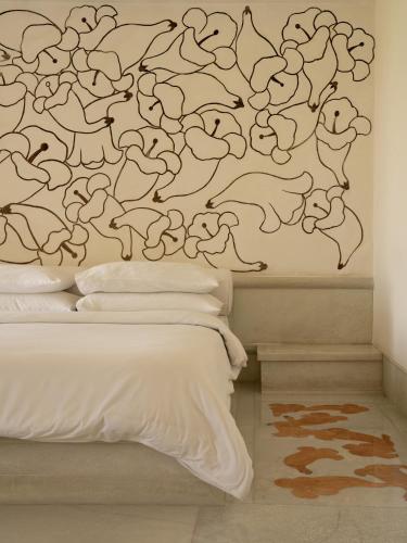Cama o camas de una habitación en RAAS Devigarh