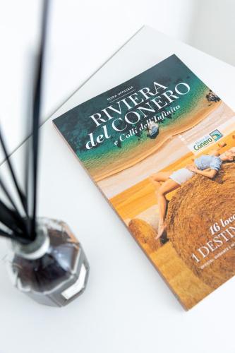 a magazine sitting on top of a table at Amarena Vacanze in Porto Recanati