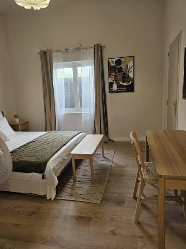 Postel nebo postele na pokoji v ubytování Tropical Oasis Hôtel