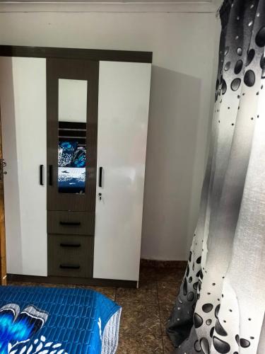 Ένα ή περισσότερα κρεβάτια σε δωμάτιο στο Karee Gardens B&B