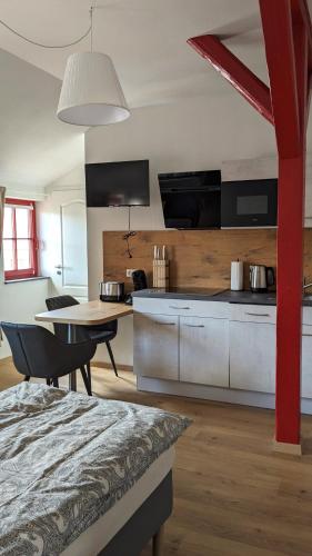 Kuchyň nebo kuchyňský kout v ubytování Lederkappe Apartments