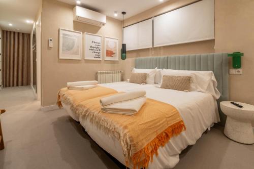 Katil atau katil-katil dalam bilik di WOW APARTAMENTOS VALLADOLID