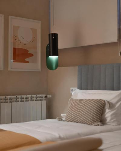 Katil atau katil-katil dalam bilik di WOW APARTAMENTOS VALLADOLID