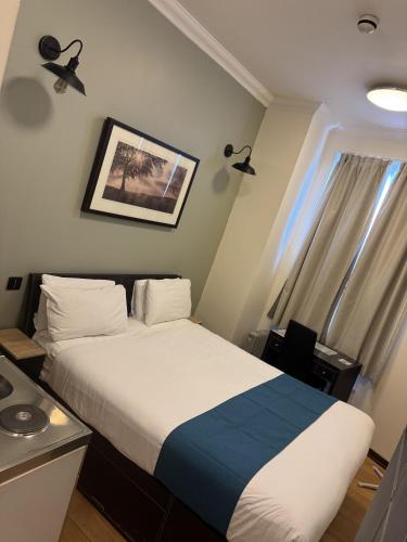 Katil atau katil-katil dalam bilik di The Royale Chulan Hyde Park Hotel