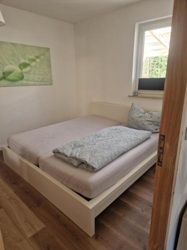 Postel nebo postele na pokoji v ubytování Bungalow 2Eickhof