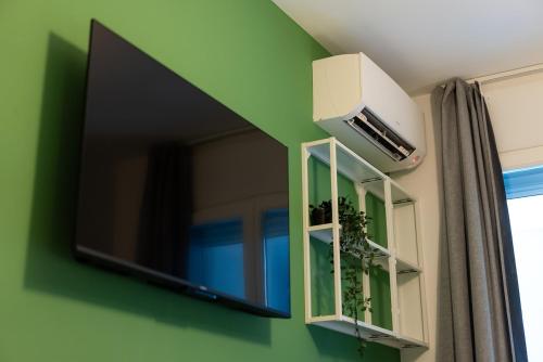 TV/Unterhaltungsangebot in der Unterkunft Design a 2 passi dal mare