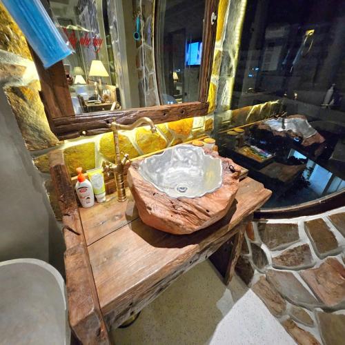 a bathroom with a sink and a mirror at Victory Hotel in Hue