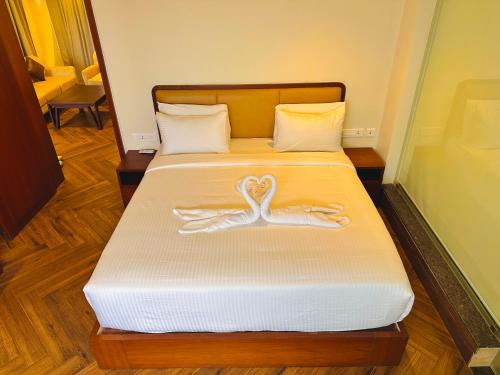Letto o letti in una camera di Talenresort Vythiri Villas