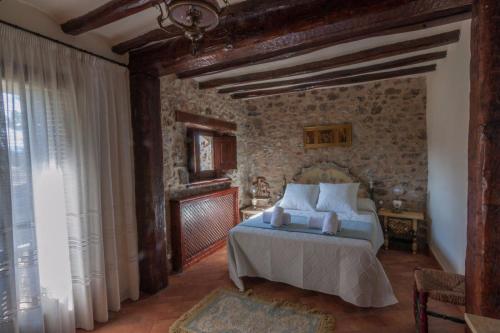 Postel nebo postele na pokoji v ubytování Mas Cordonets