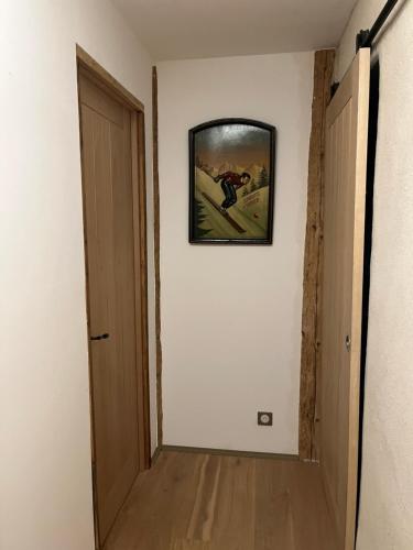 Televisyen dan/atau pusat hiburan di Gite les 4 Saisons - chambre Printemps