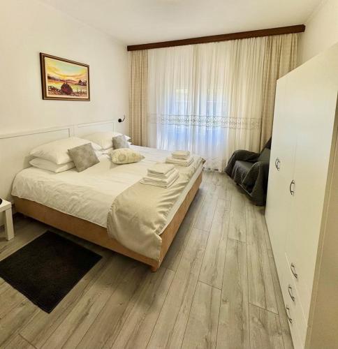 Una cama o camas en una habitación de Apartment Ambretta