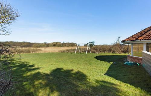 a large grassy yard with a gazebo at Pet Friendly Home In Humble With Sauna in Humble