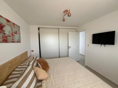 Et tv og/eller underholdning på Complejo Bahía del Sol