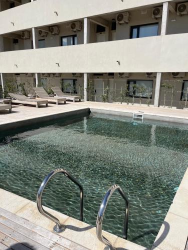 Swimmingpoolen hos eller tæt på Complejo Bahía del Sol