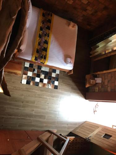 an overhead view of a room with a checkered floor at Masaka Cultural Resort in Masaka