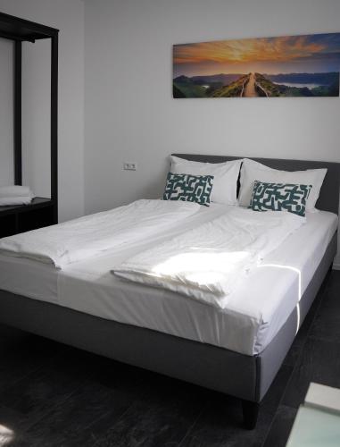 Ένα ή περισσότερα κρεβάτια σε δωμάτιο στο Space Hotel Double Rooms