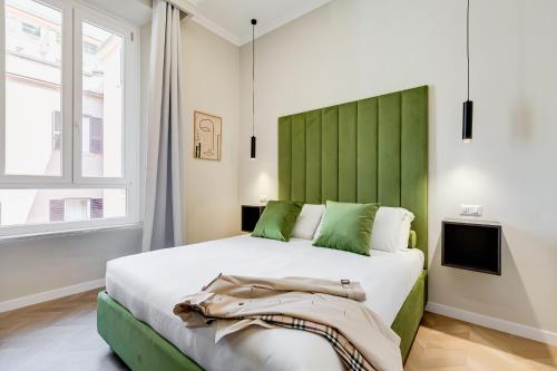 Postel nebo postele na pokoji v ubytování Dionigi 43 Private Suites by Premium Suites Collection