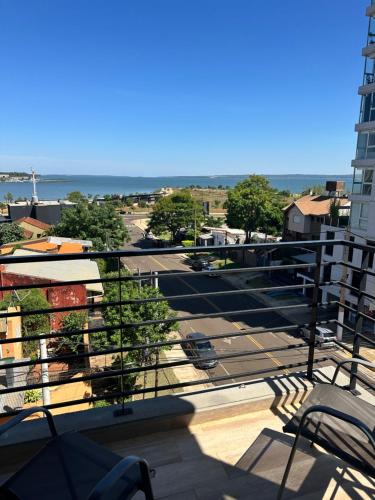 a balcony with a view of a parking lot at LOFTIER COSTANERA Depto 402 in Posadas