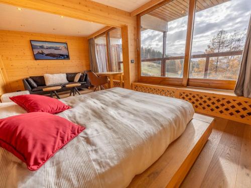 Ένα ή περισσότερα κρεβάτια σε δωμάτιο στο Chalet spacieux pour 14 pers., sauna, parking, proche pistes - Les Arcs 1600 - FR-1-411-959