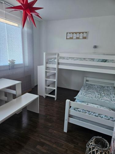 Ένα ή περισσότερα κρεβάτια σε δωμάτιο στο FeWo Ruhrpott