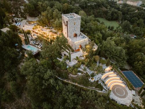 an overhead view of a building with a swimming pool at Medieval Tower In Sibillini Mountains Park in Vetice
