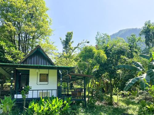 a small house in the middle of a forest at Baan Suanthip Homestay - Aoluek Natural Retreat in Ao Luk