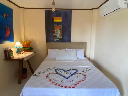 Letto o letti in una camera di Santa Claus Hilltop