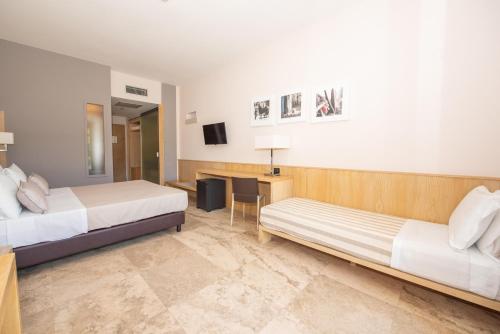 Telewizja i/lub zestaw kina domowego w obiekcie Basiliani - CDSHotels